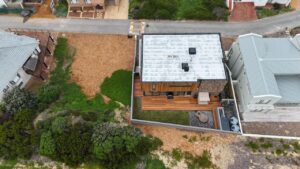 Aerial construction-progress view of House 671 and the neighbouring properties in Stilbaai